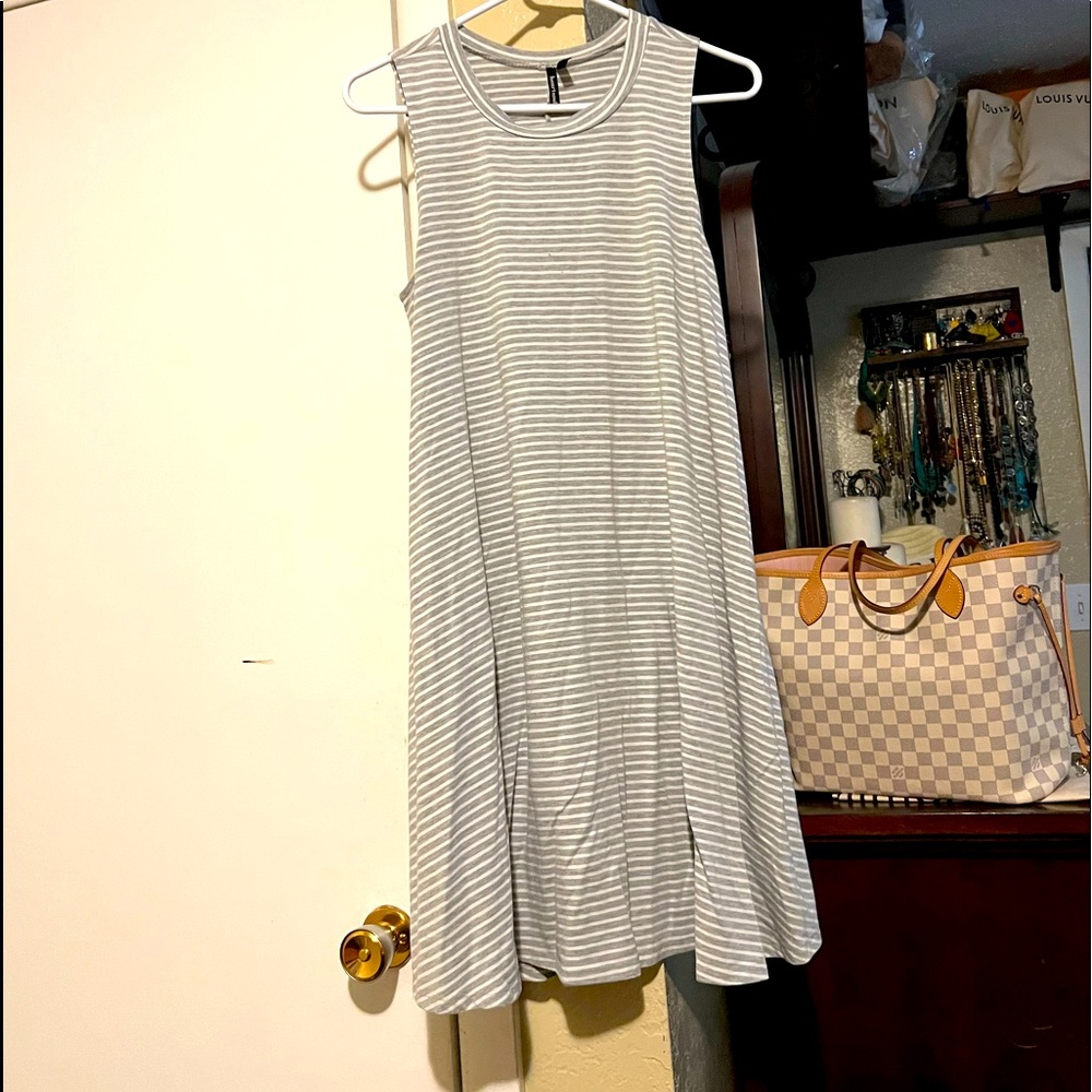 Two dresses both in good used condition size large